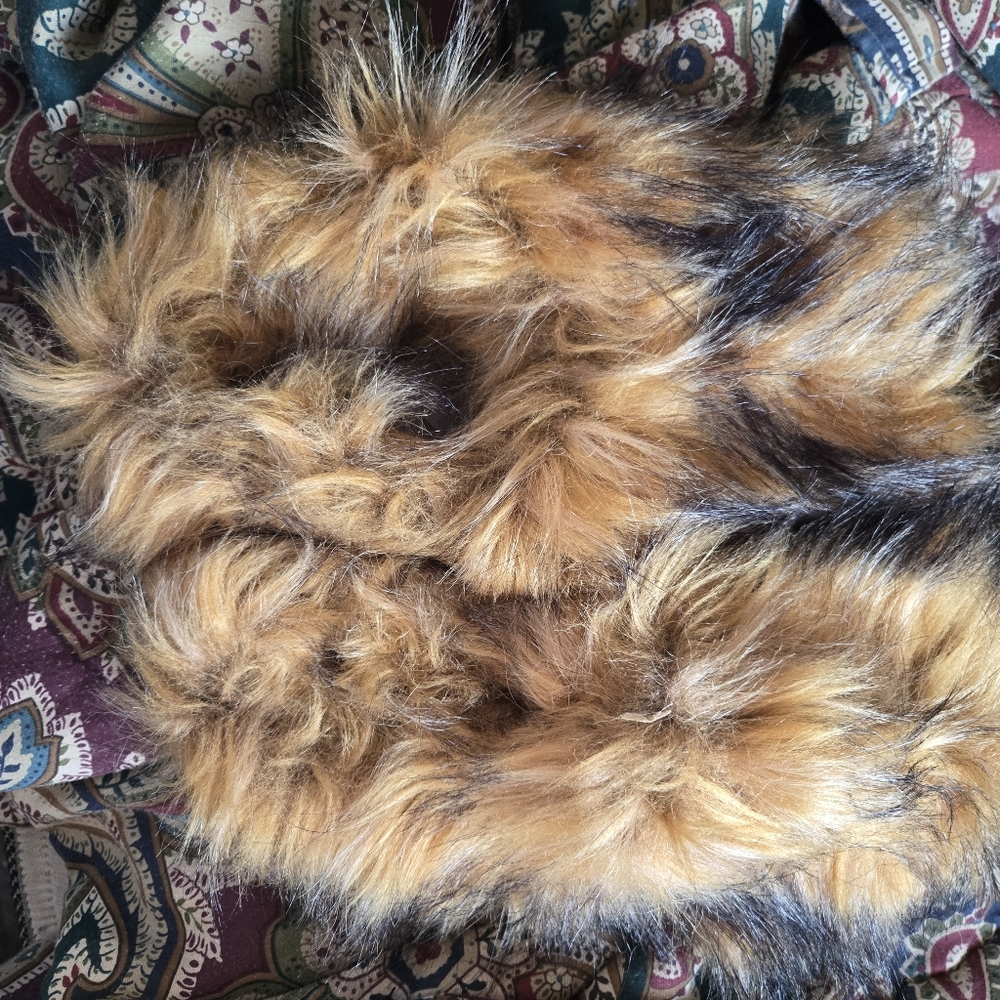 Furry Slippersin Brown and Black.